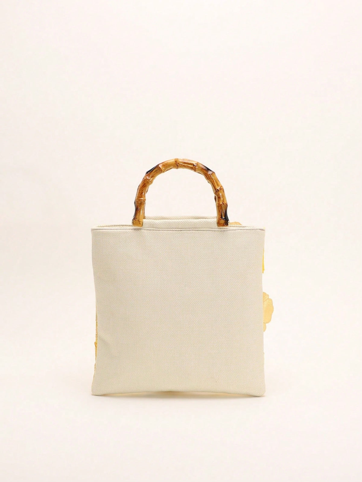 A Summer Style Beige Canvas Tote Bag With Bamboo Handle. This Women's Handbag Combines Linen And Mesh Fabric, Decorated With Exquisite 3D Floral Embroidery, Creating A Bohemian Vibe. It Is The Perfect