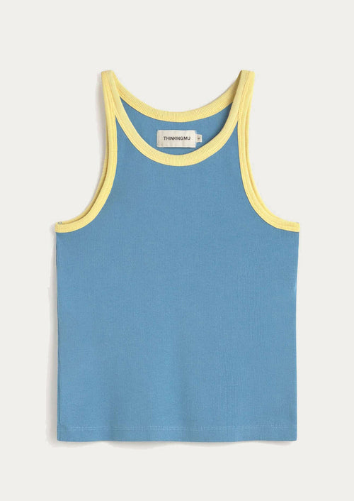Blue tank top with yellow trim on a light gray background
