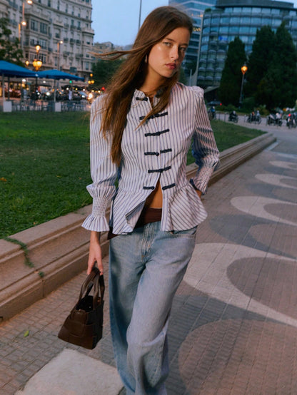 Nöista Striped Blouse With An Elegant Mandarin Collar, A Fitted Peplum Silhouette And Stylish Ruched Cuffs, Offering Refined Feminine