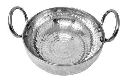 Silver hammered metal bowl with handles on a white background