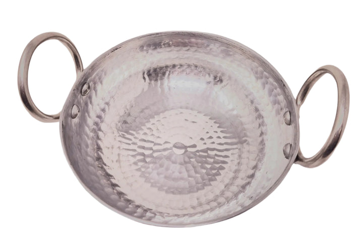 Silver metal dish with handles on a white background