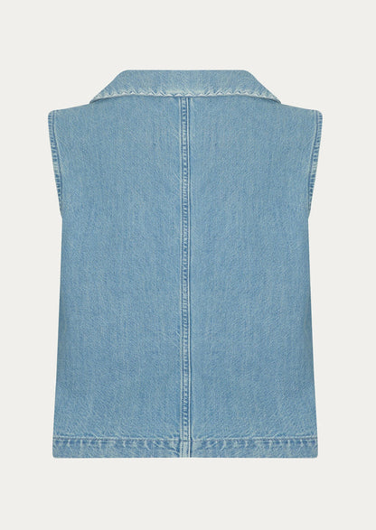 A sleeveless button front top with pointed collar, in light wash denim.