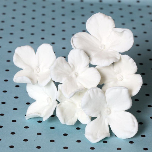 White Hydrangeas sugarflowers gumpaste cake decorations perfect for cake decorating fondant cakes as a cake topper.  Wholesale bakery supplies.